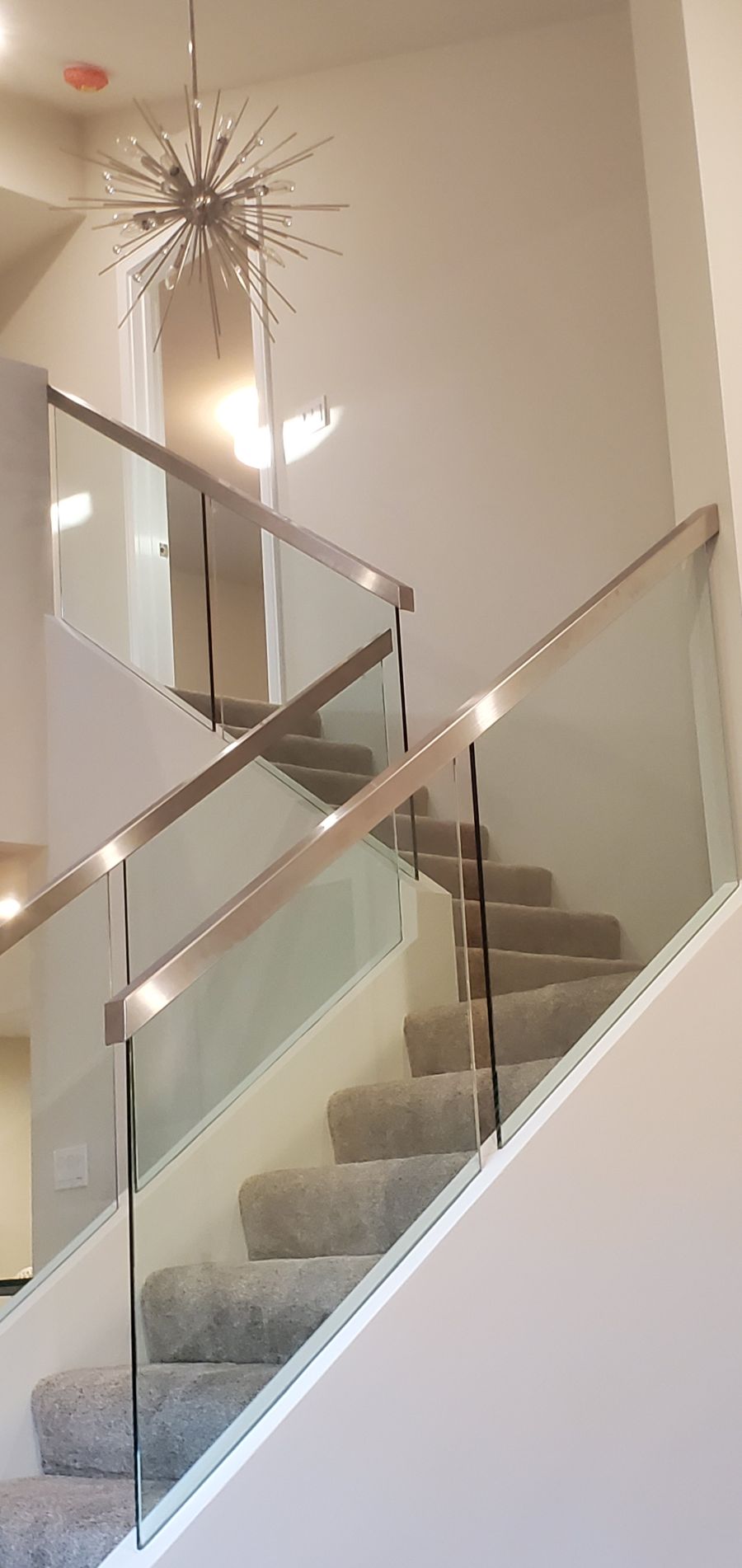 metal and glass stairwell bannister