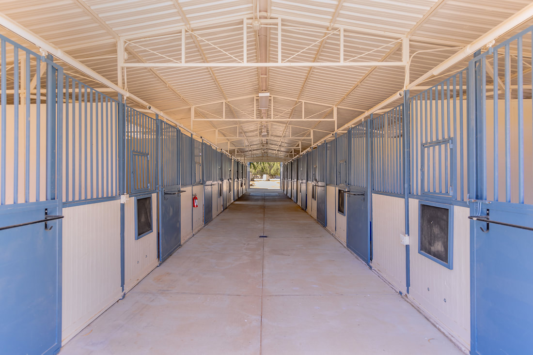 interior of horse barn at Rancho Royale
