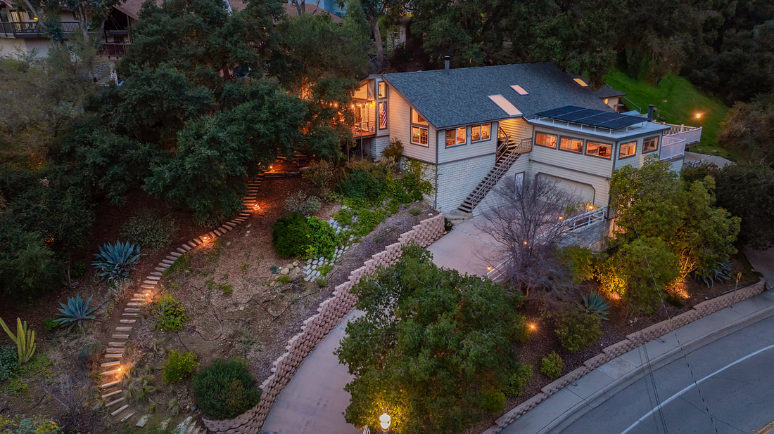 Aerial view of oak view home for sale at twilight
